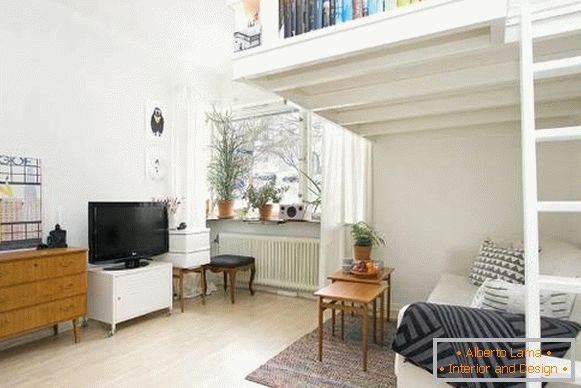 Design intelligent d'un appartement d'une pièce de 35 m² avec intérieur photo