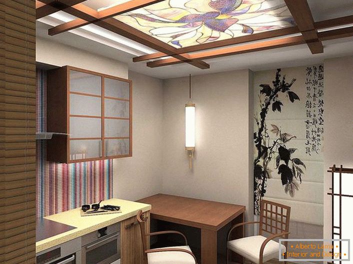 Une cuisine élégante, comme exemple du fait que 12 mètres carrés peuvent également être décorés avec élégance et fonctionnalité.