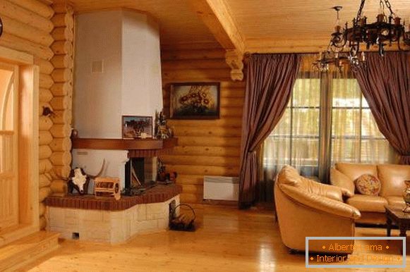 Intérieur moderne d'une maison en bois à partir de rondins à l'intérieur - photo