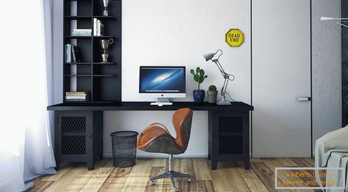 Pour le style loft, le mobilier est correctement choisi. L'ensemble sombre contraste avec une finition légère et un sol brun pâle. 