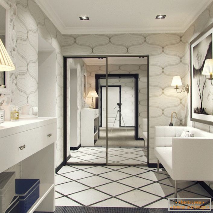Les formes géométriques claires des meubles sont soulignées par un design intéressant des murs. Une grande armoire à miroir - une chose indispensable à l'intérieur.