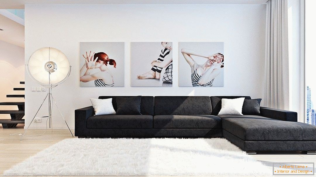 Salon de style minimaliste avec des peintures