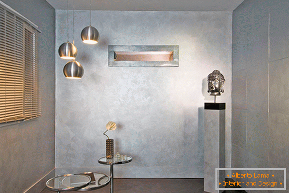 Peinture décorative pour murs dans un appartement avec un effet métallique
