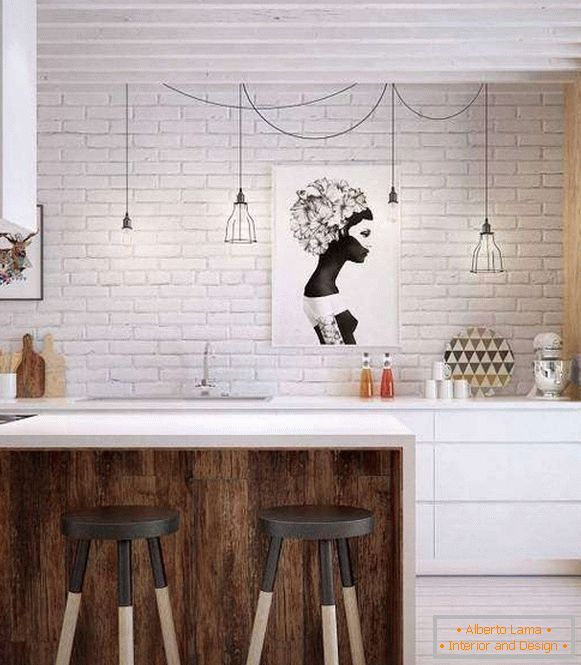 Mur de briques blanches dans la cuisine dans le style loft