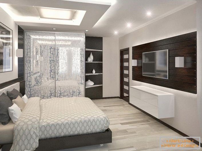 Chambre lumineuse et spacieuse dans un style high-tech. Le mobilier correctement assorti se combine organiquement avec les éléments de décoration.