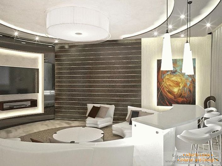Le designer a sélectionné avec succès l’éclairage du salon dans le style de la haute technologie. Les plafonds suspendus à plusieurs étages ont une allure favorable avec un éclairage ponctuel.