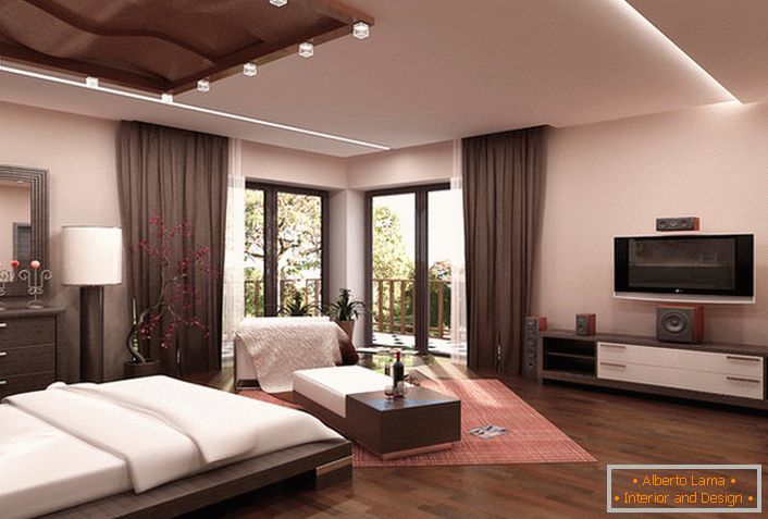 Une chambre spacieuse dans un style high-tech dans les tons beiges chez une jeune famille à Rome.