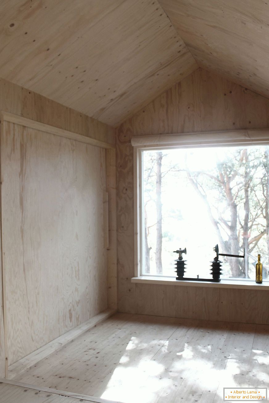 Intérieur de la mini maison Ermitage en Suède