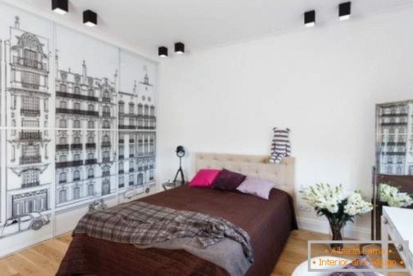 Design de chambre à coucher avec une armoire à compartiments avec un motif noir et blanc