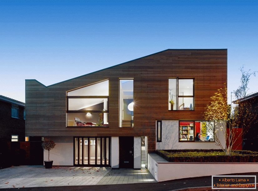 Une maison moderne et chaleureuse avec une façade extérieure du studio Stephenson ISA