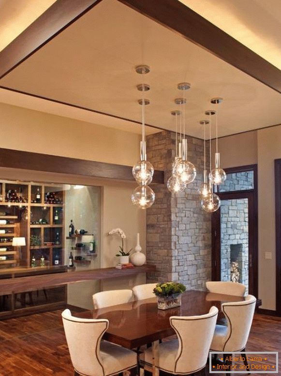 Plafond sculptural avec éclairage dans la conception de la cuisine