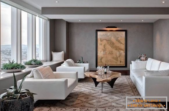 Le design du salon avec des meubles blancs - une photo avec des murs gris