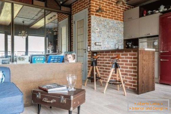 Appartement design studio de 40 m² style loft - photo cuisine salon