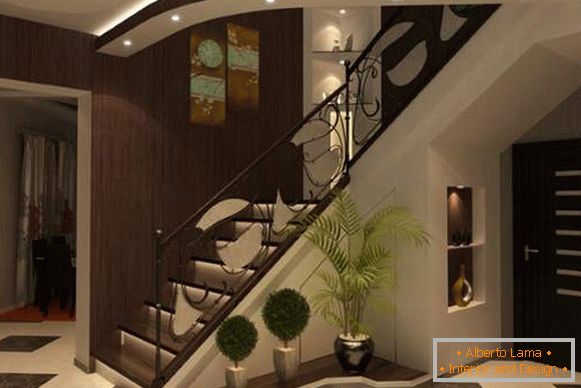 Conception d'un hall d'entrée avec un escalier dans une maison privée dans des tons sombres