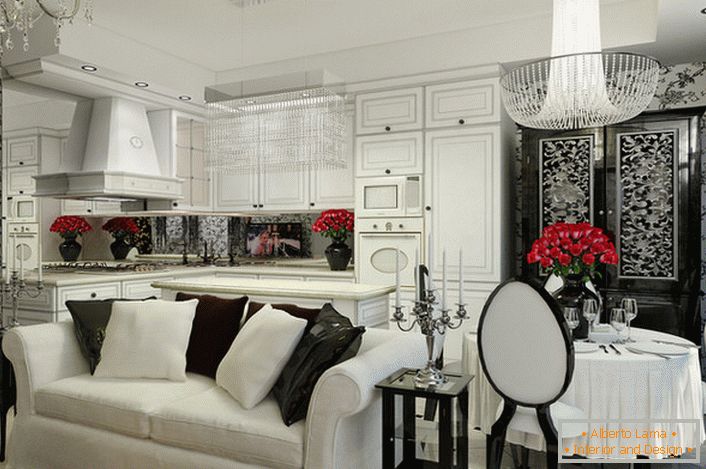 Cuisine-salon dans le style Art déco avec suite blanche et appareils encastrés.