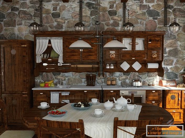 Pour décorer la cuisine de campagne a été choisi un ensemble de couleur bois wengé.