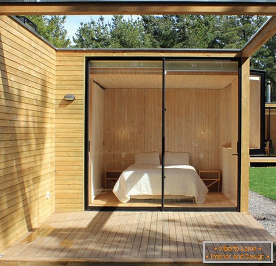 Chambre dans une maison modulaire en bois