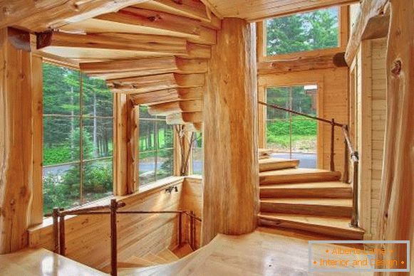 Conception d'un escalier en bois dans une maison en bois
