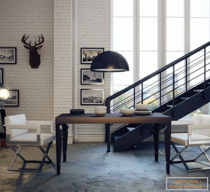 Le style loft peut être léger et élégant. Peindre les murs, mettre des formes laconiques de meubles modernes, photo à l'intérieur.