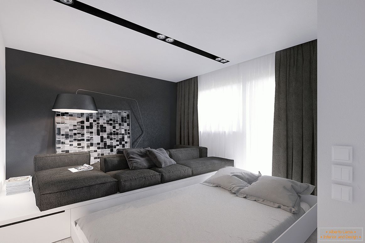 Un lit gigogne dans le salon d'un petit appartement
