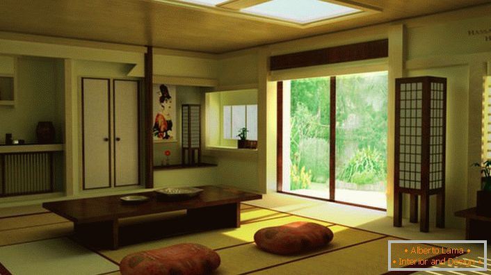 Sur la présence du minimalisme japonais dans le salon dans une maison de campagne raconte le bon mobilier. Une table basse est idéale pour boire du thé à la maison. 