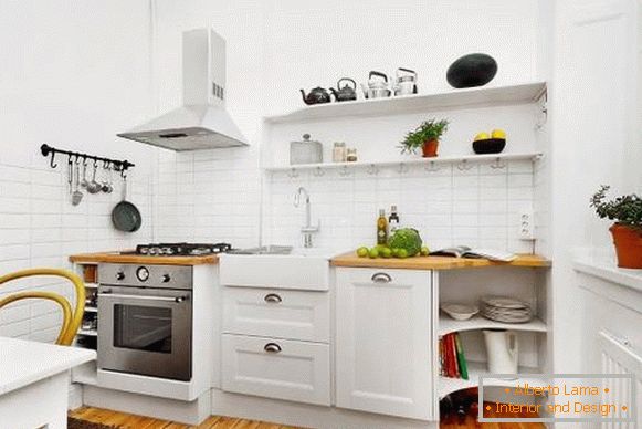 Фото необычного etнтерьера кухнet в белом цвете