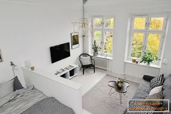 Appartement d'une pièce de style scandinave - salon et chambre