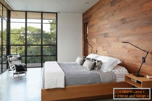 Options pour décorer les murs avec du bois à l'intérieur de la chambre