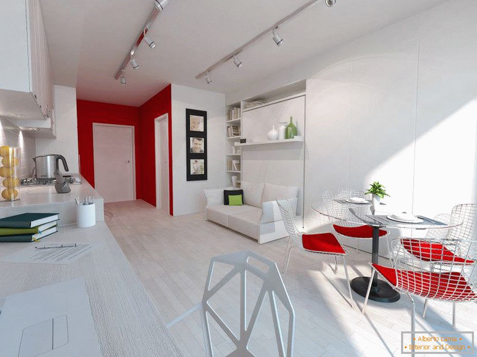 Intérieur blanc d'un petit appartement aux accents rouges