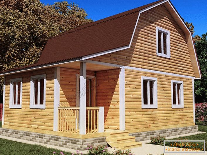 Une simple maison en bois avec un grenier.