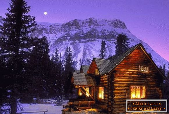 Lodge en bois avec vue sur la montagne
