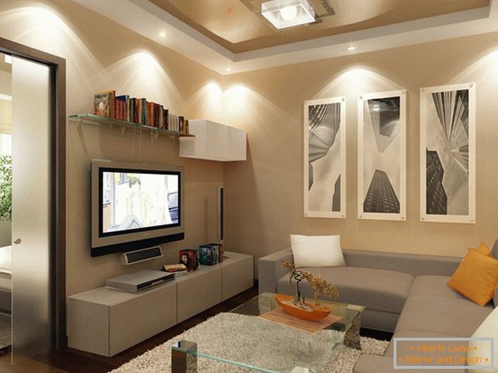 Des plafonds tendus de couleur beige et blanche se fondent dans le salon moderne.
